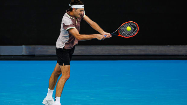 Taylor Fritz hits a shot at the 2024 Australian Open.